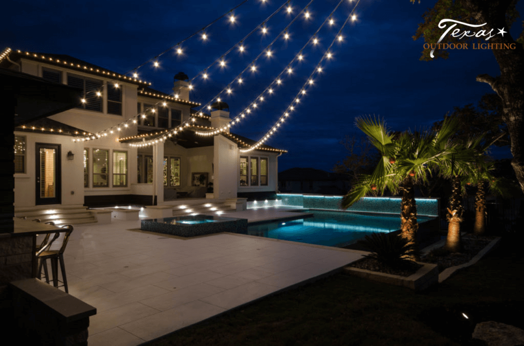 Cafe Bistro Lighting in a beautiful outdoor living space poolside in Lakeway Texas